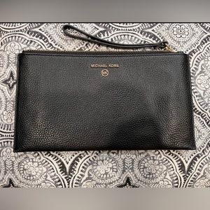 Large Michael Kors black pebbles leather slim wristlet pouch EUC used once